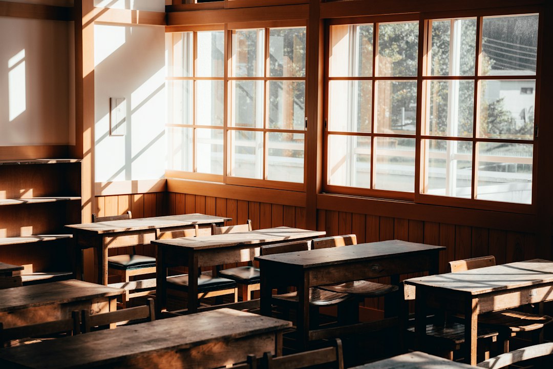 An empty classroom with desks — the kind of space a resource assessment must account for